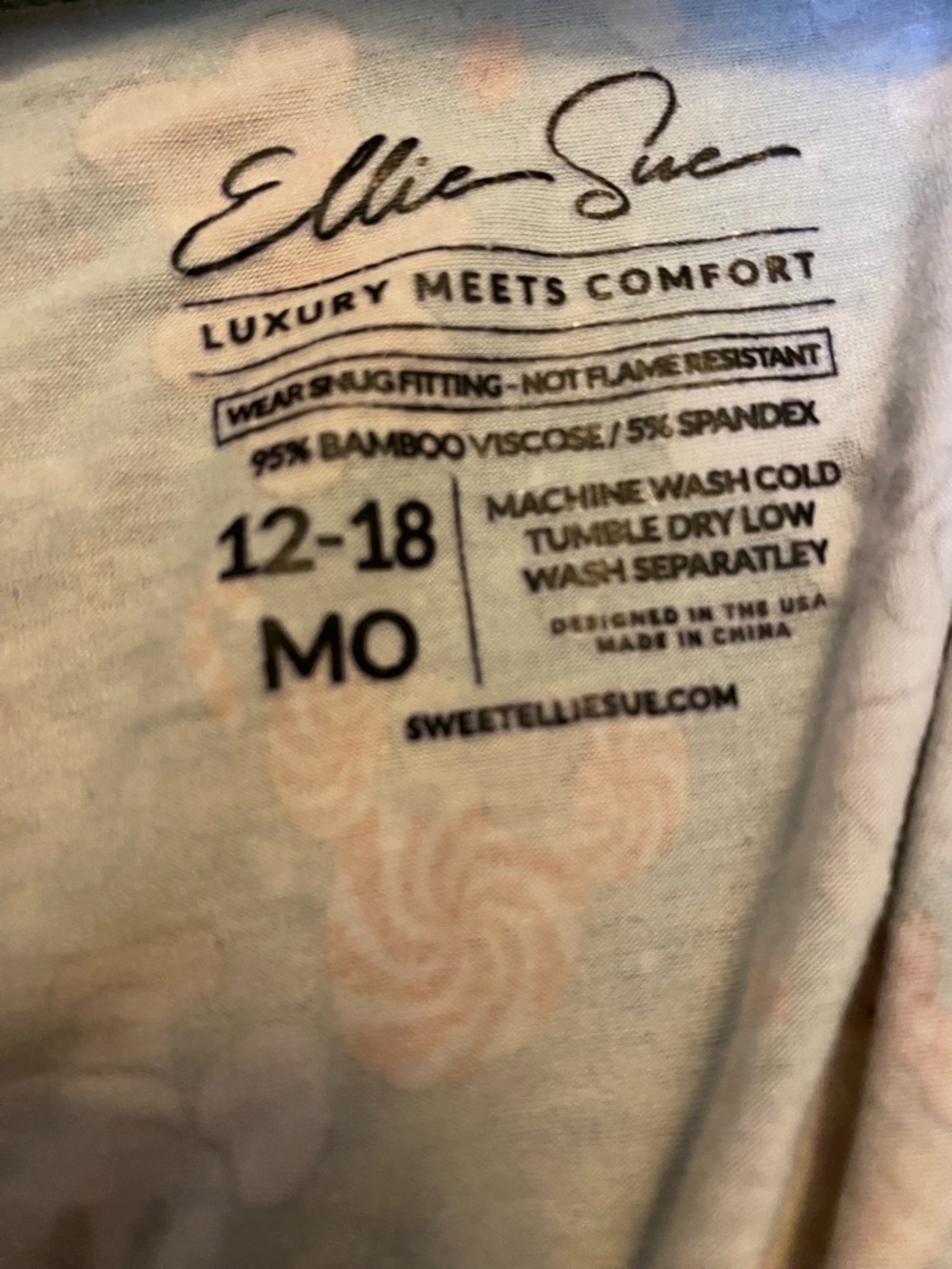 Elle festive mint green romper with red and cream accents